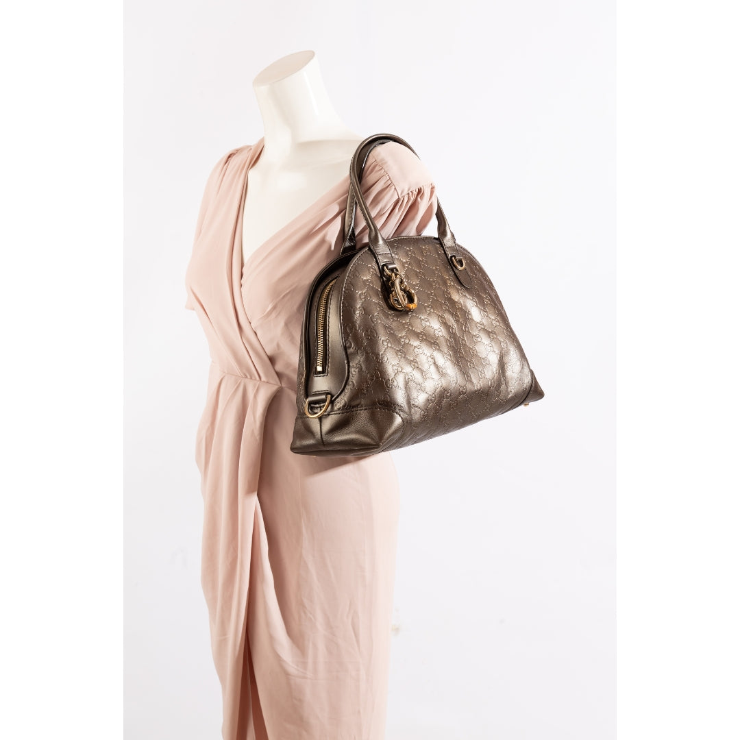 Gucci Bronze Guccissima Heart Charm Dome Satchel