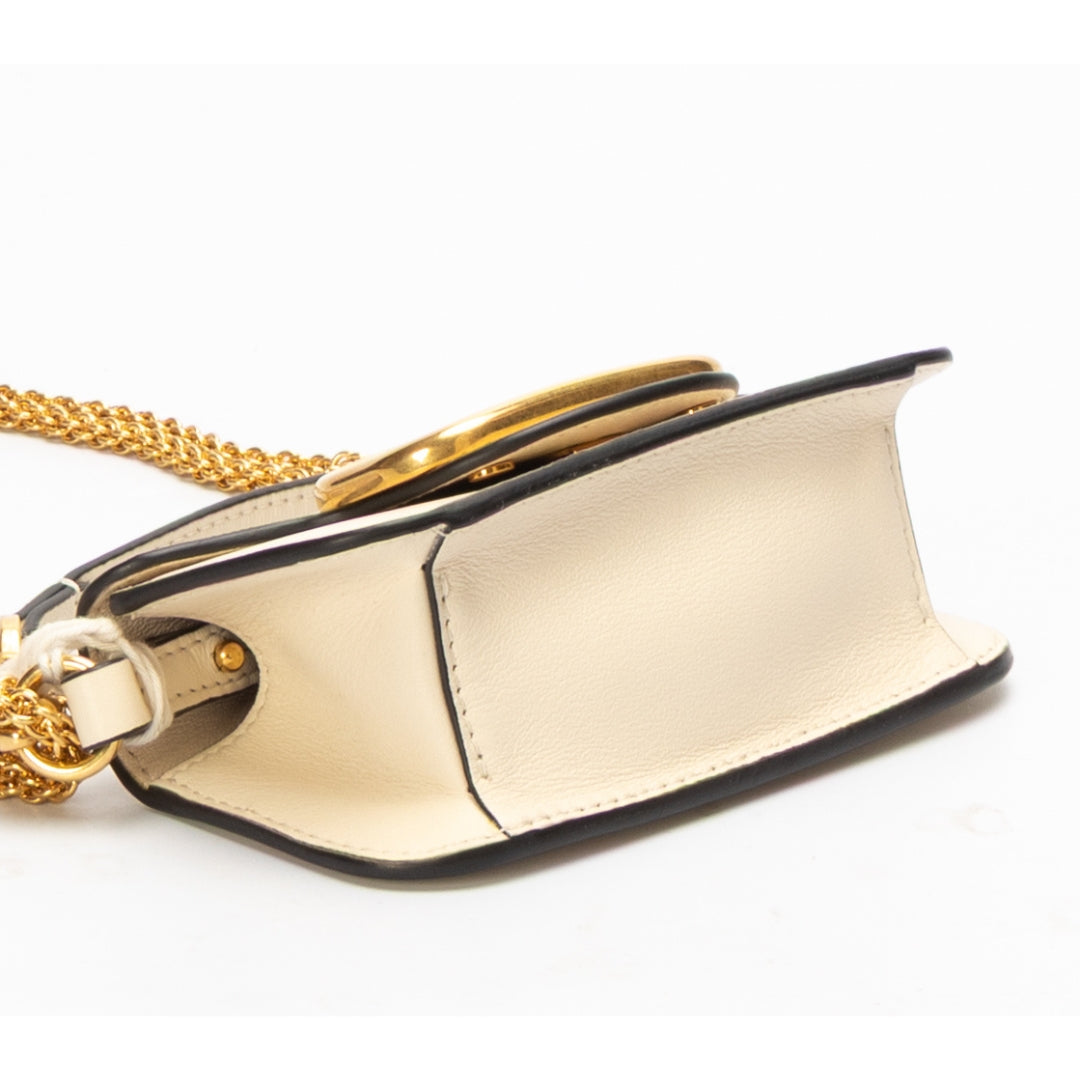 Valentino Garavani Locò Small Off-White Shoulder Bag