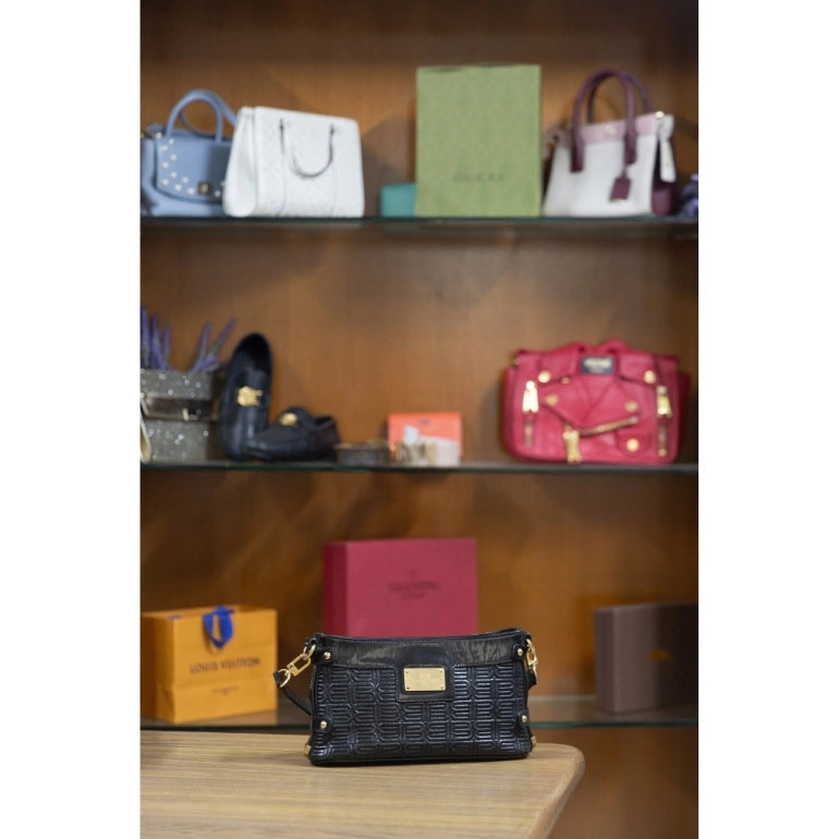 Balenciaga Logo Embossed Leather Pochette