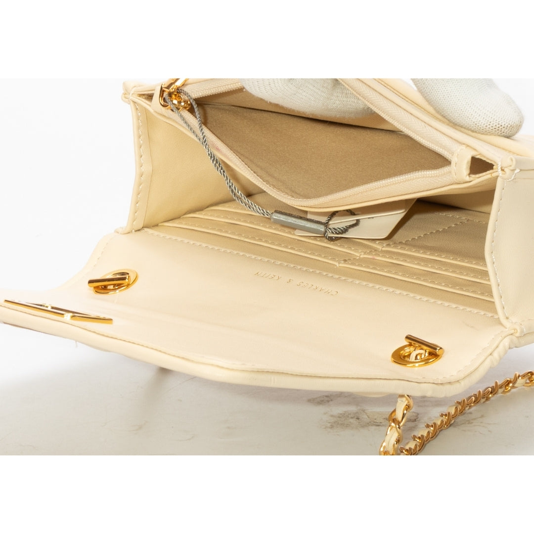 Charles & Keith Flip-lock Quilted Crossbody Bag