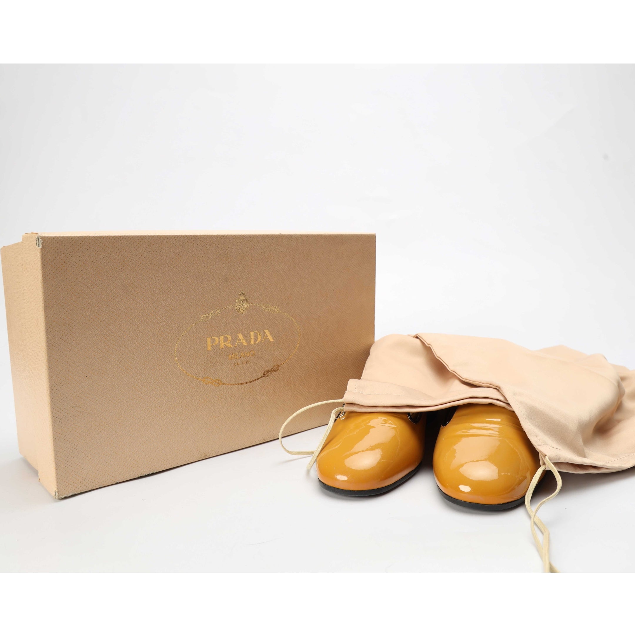 Prada Beige Patent Smoking Slip Ons