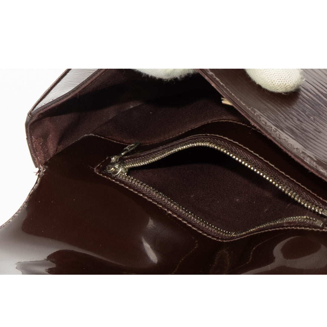 Louis Vuitton Amarante Sobe Clutch