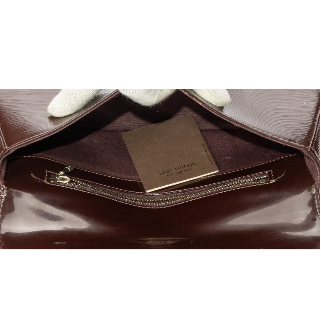 Louis Vuitton Amarante Sobe Clutch