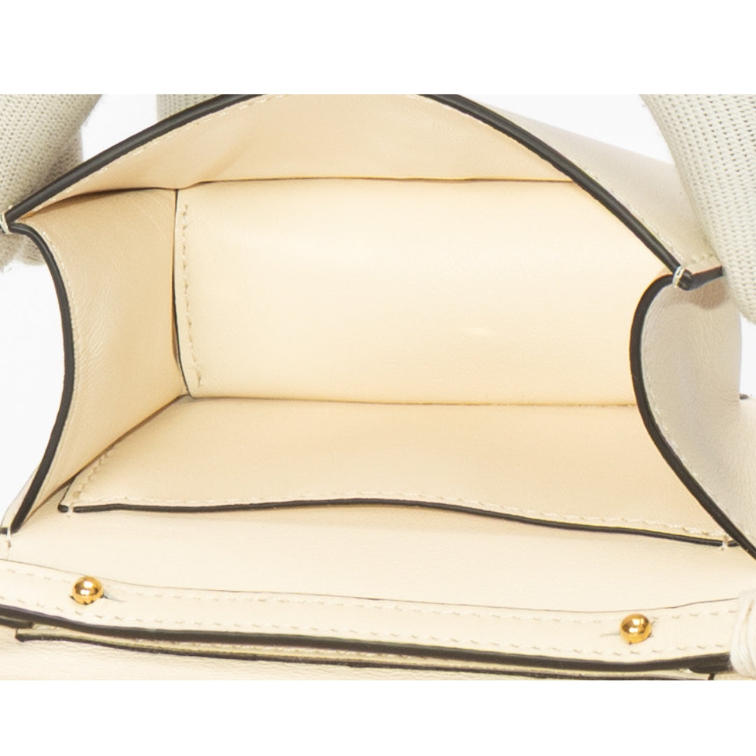 Valentino Garavani Locò Small Off-White Shoulder Bag