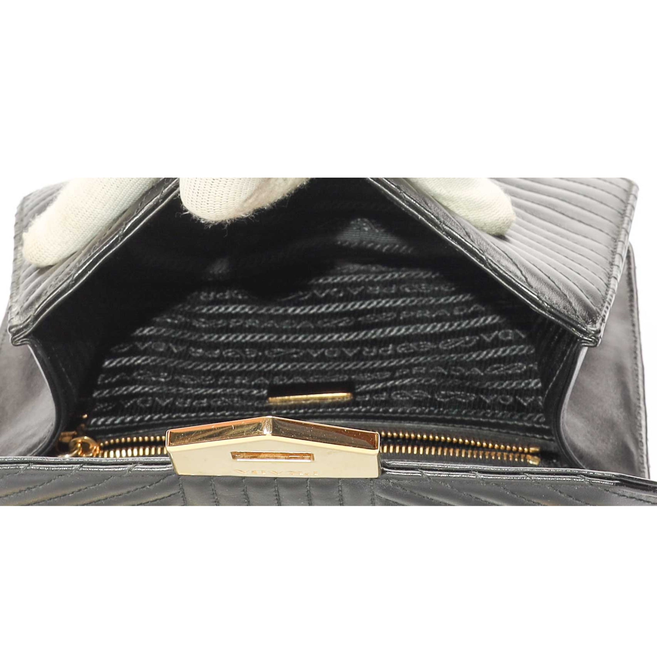 Prada Chevron Impunture Turn Lock Crossbody Bag