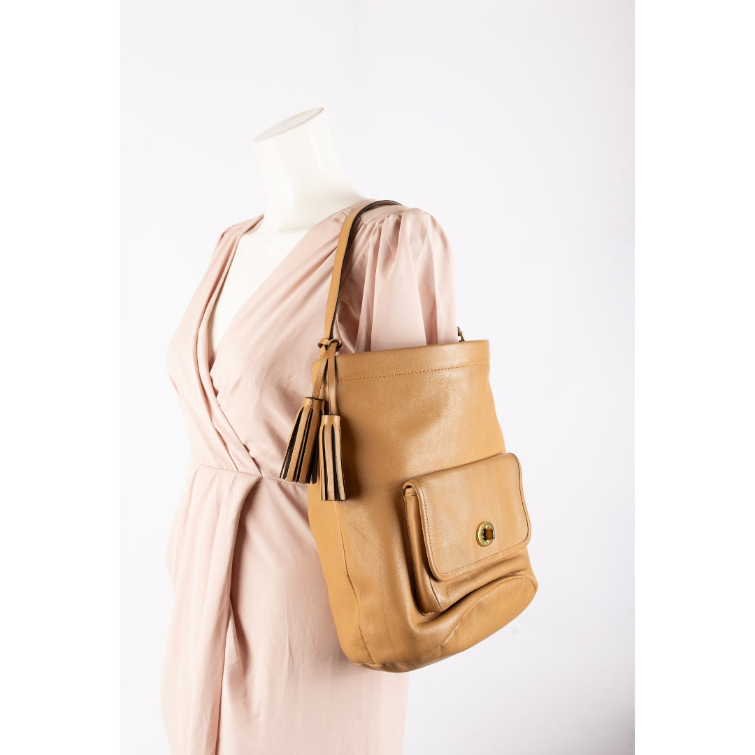 Coach Beige Leather Legacy Tassel Bucket Bag